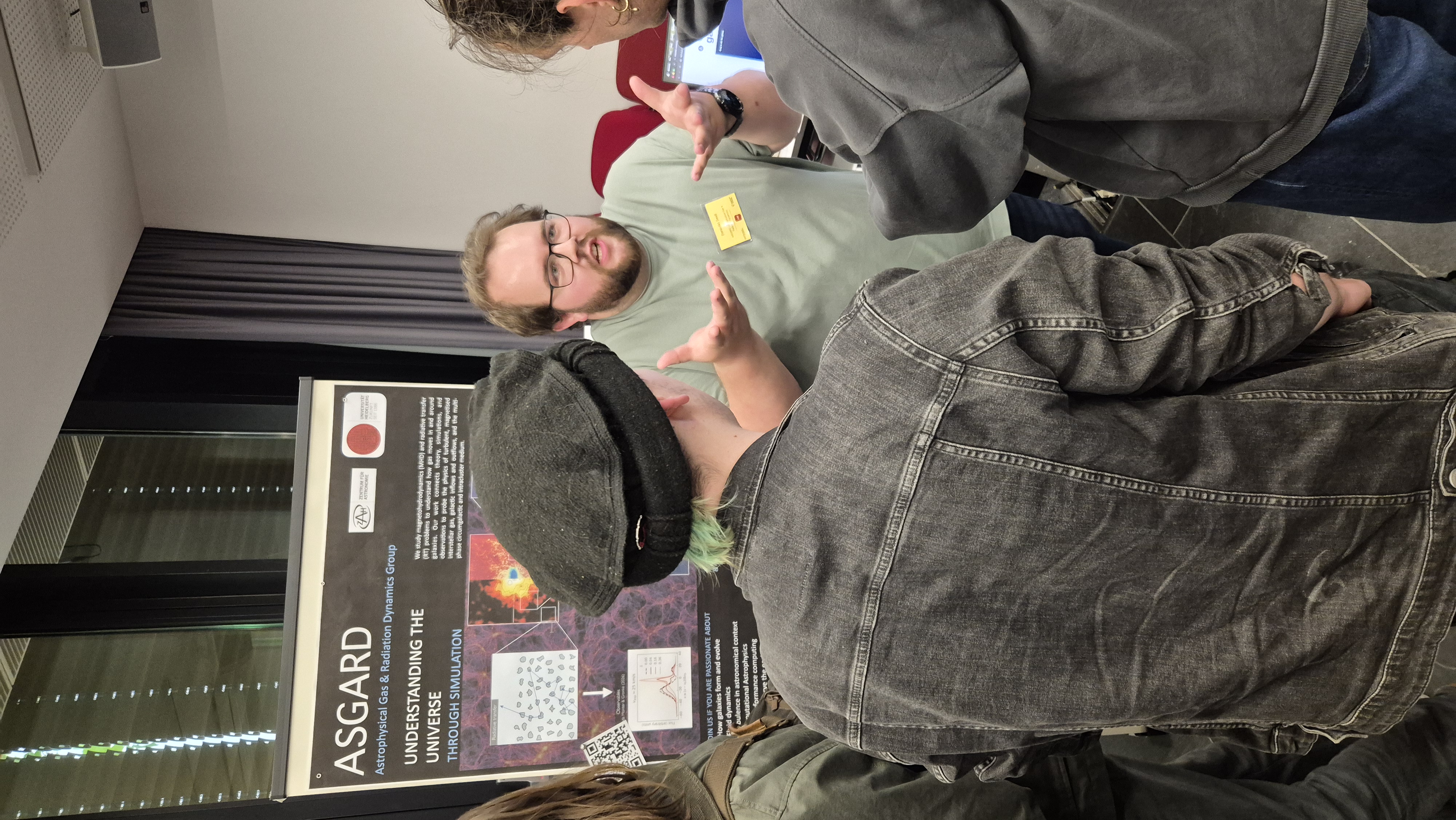 Visitors at the AIM26 stand